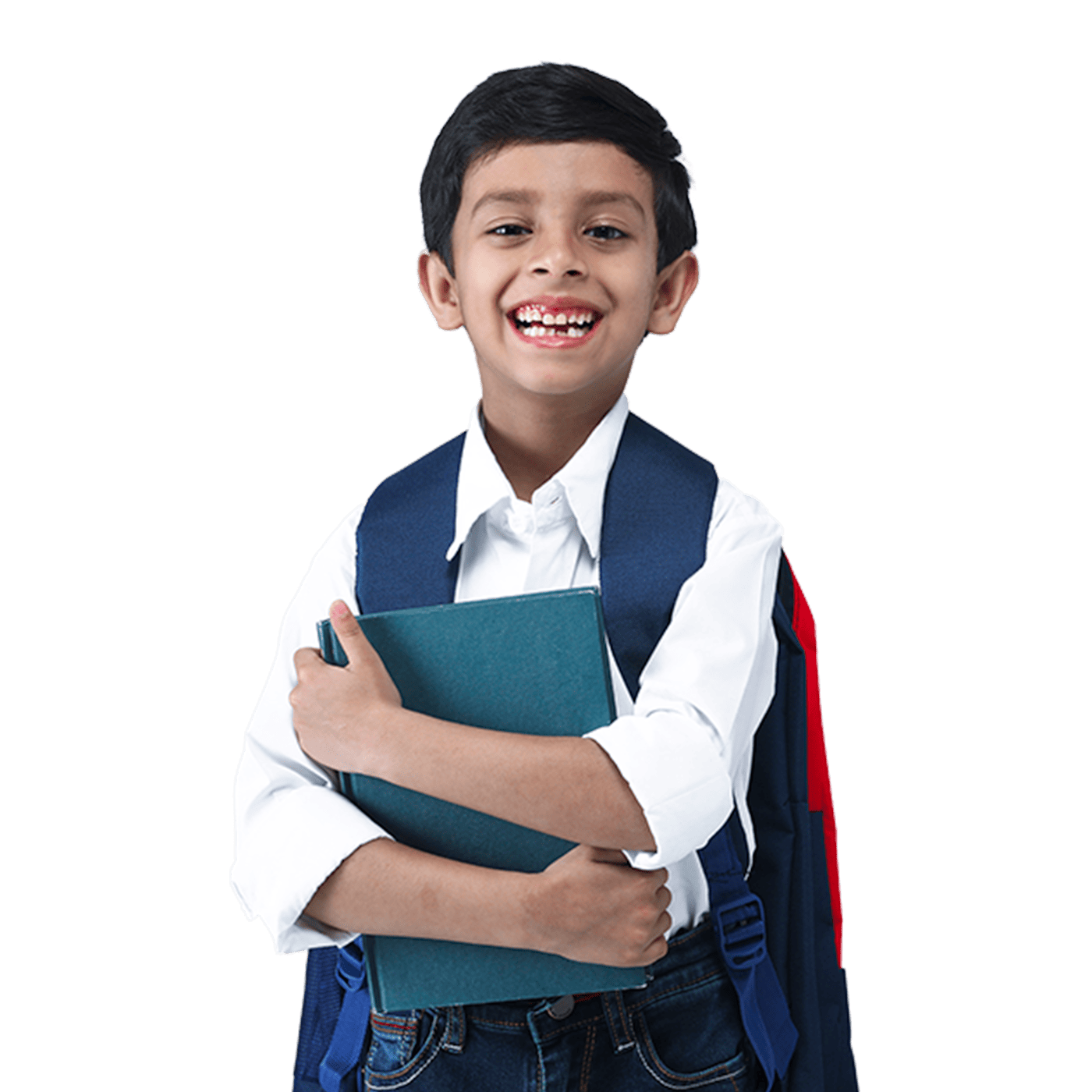 Young boy smiling while holding book and wearing backpack